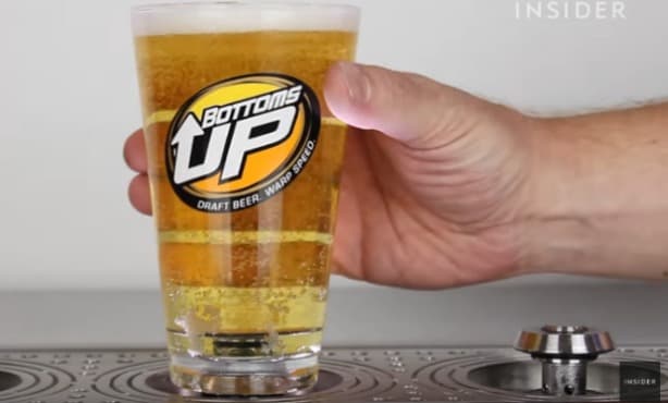 Bottoms up draft beer dispensing system