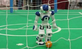 Robots hone their soccer skills in Eindhoven